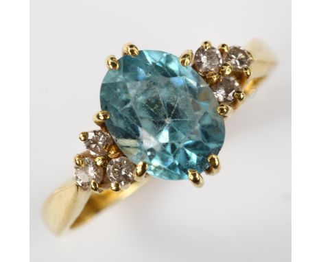 A late 20th century 18ct gold blue zircon and diamond dress ring, set with oval mixed-cut zircon and modern round brilliant-c