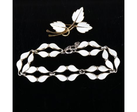 A Vintage Norwegian vermeil sterling silver and white enamel leaf panel bracelet, and a similar Danish silver brooch, by Jema