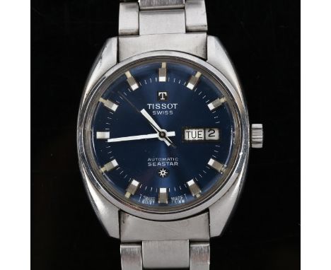 TISSOT - a stainless steel Seastar automatic bracelet watch, ref. 46660-4X, blue dial with steel baton hour markers, sweep ce