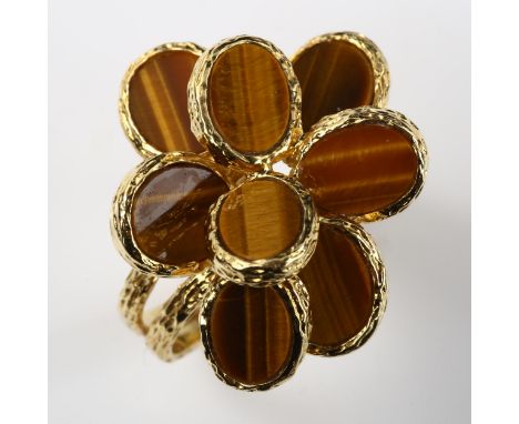 A 1970s 18ct gold tigers eye abstract ring, allover textured settings, maker's marks indistinct, import hallmarks London 1972