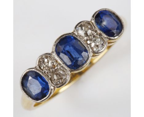 An 18ct gold seven stone sapphire and diamond half hoop ring, set with oval mixed-cut sapphire and old-cut diamonds, setting 