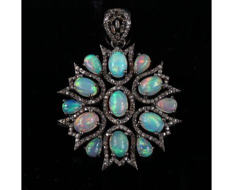 A modern oxidised sterling silver opal and diamond floral pendant, set with oval and pear cabochon opals with rose-cut diamon