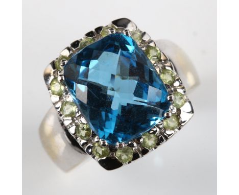 A modern 14ct white gold blue topaz cluster dress ring, setting height 15.8mm, size M, 7.8g 