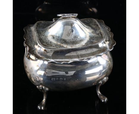 An Edwardian silver tea caddy, oval bulbous form with scalloped rim and ring handles, by Boardman, Glossop &amp; Co Ltd, hall