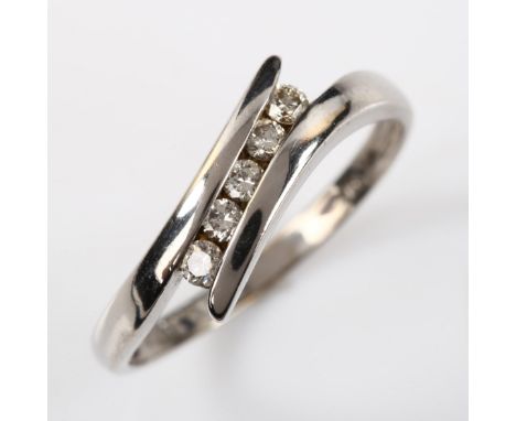 A modern 9ct white gold five stone diamond crossover ring, set with modern round brilliant-cut diamonds, total diamond conten