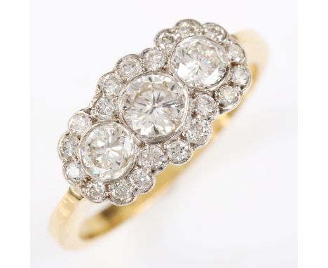 An 18ct gold diamond triple-cluster dress ring, set with modern round brilliant-cut diamonds, total diamond content approx 1c