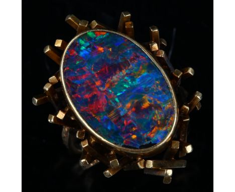 A late 20th century 18ct gold black opal doublet abstract ring, with a cuboid tube basket and textured shank, setting height 