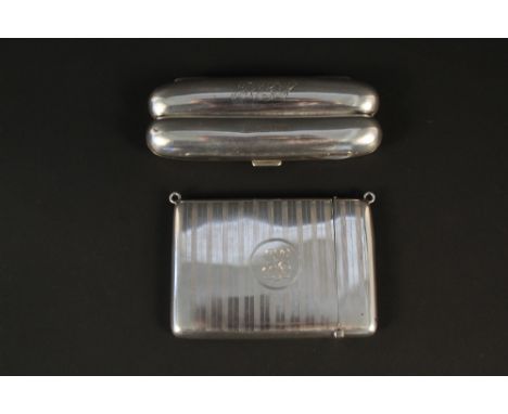 A silver card case with engine turned detail and engraved cartouche (with later added suspension hoops) and a silver cigar ca