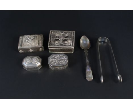 Four eastern white metal snuff/pill boxes, one with filigree decoration, a silver spoon and silver tongs