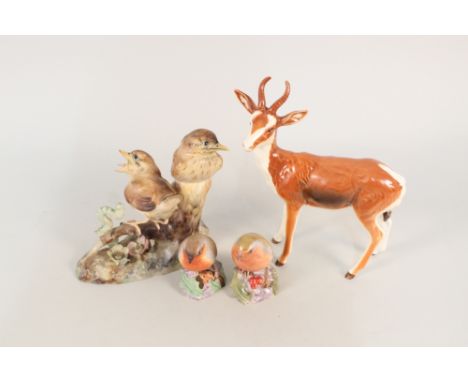 Royal Crown Derby thrush chicks, two Royal Worcester robins plus a Beswick deer