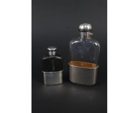 A silver and glass hip flask with detachable silver cup, leather top (as found), monogram engraved to lid (no marks visible),