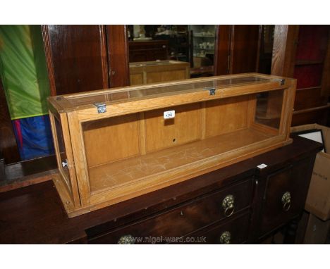 A light Oak framed glass display Case, ideal for the display of a trophy or a model engineering subject, unusually having doo