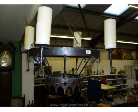 A wrought iron hanging Candle light and a pair of matching wall sconces