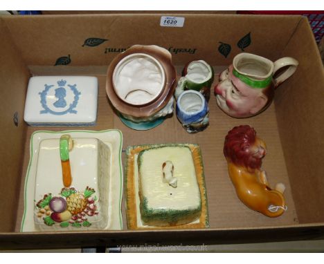 Four Toby jugs, two cheese/butter dishes and a lion ornament and Wedgwood coronation trinket box.