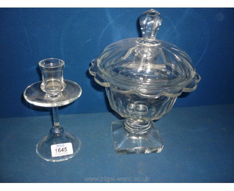 A good thumbs cut footed glass bowl with lid and a hand blown candlestick.