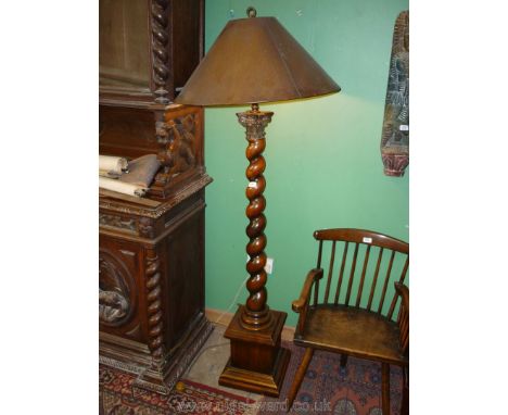 An attractive and substantial Standard Lamp having heavy twist pillar, plinth type base and Cornithian type captial, the shad