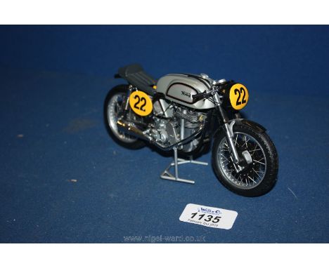 A 'Manx Norton' Mini Champs metal model Motorbike.