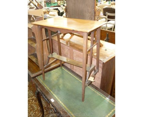 A pretty Edwardian Mahogany arts and crafts style rectangular occasional Table with narrow shelf/stretcher, one leg requires 