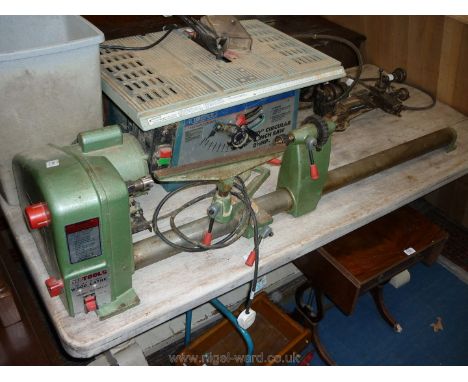 A NuTools 240v Wood turning Lathe model no. ''NWL 37'' and a quantity of wood turning chisels, chucks, lathe fittings, etc.