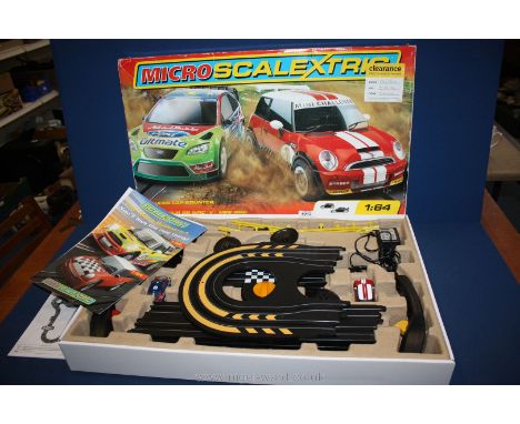 A micro Scalextric boxed.