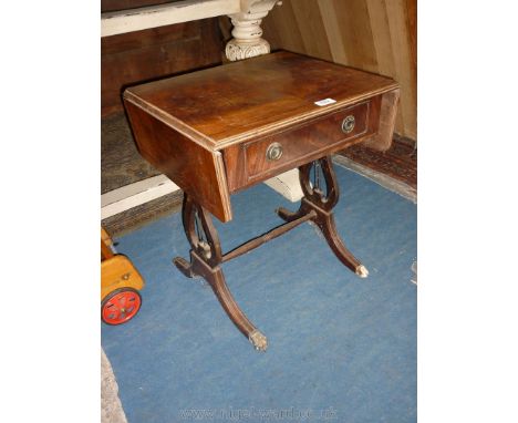 A reproduction lyre ended Sofa Table with a frieze drawer, the top 14 3/4'' x 17 1/4'' extending to 29 1/4'', 21'' high, (fee