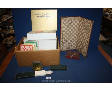 A box of miscellanea to include a Victory Jigsaw puzzle, dressing table set, slide rule, Halma Board game, a Clinometer, and 