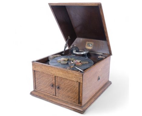 "His Master's Voice", an HMV wind-up gramophone model no. 4, in oak case, made by The Gramophone Company Ltd of Middlesex Eng