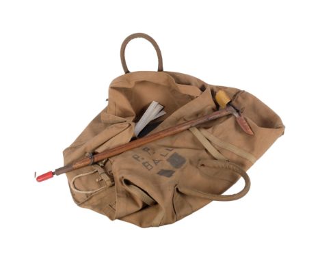A Vintage mountaineer's climbing pickaxe, and a canvas travel bag (2) 