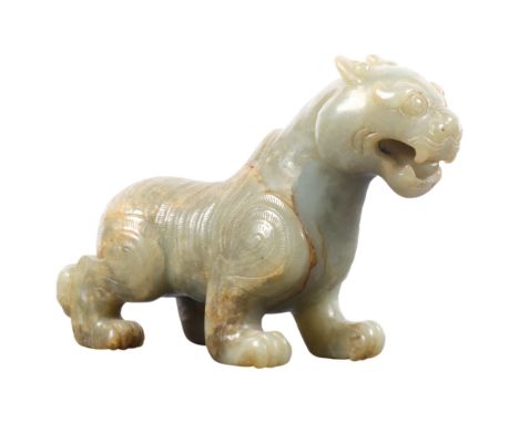 A Chinese carved celadon jade Kylin, 12cm 