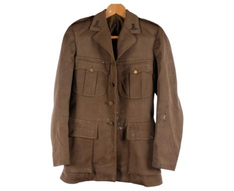 Vintage Army jacket with badges, a collar, a leather holster, etc 