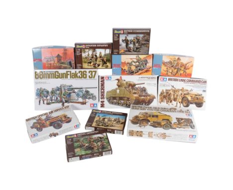 A large quantity of plastic model kits, including Hasegawa Hobby Kits, Revell, and Tamiya, all military related in nature, ge