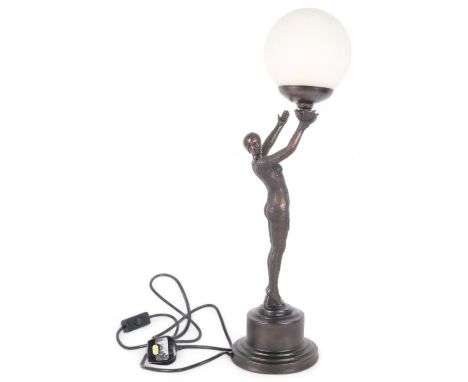 An Art Deco style patinated resin figural dancer table lamp, with crackle glass globe shade, H62cm 