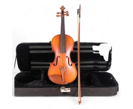 A modern full-size violin, label to the inside reads "St Martin-in-the-Fields, Model No. 4457", with associated bow and in ha