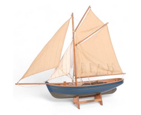 A Vintage wooden hulled 'The Prawner' model boat on stand, hull 45cm, H54cm 
