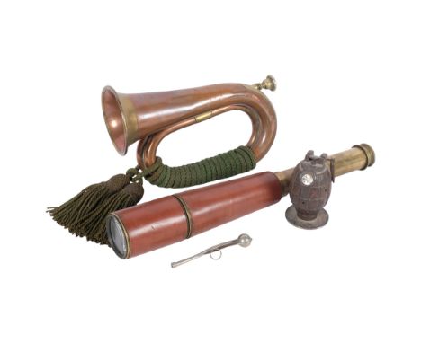 A military copper and brass bugle, a Boson's whistle, a grenade paperweight, a 4-draw brass and leather telescope by W Watson