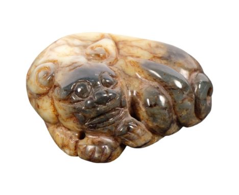 A Chinese pale celadon jade carving of a Qilin, 5.5cm 