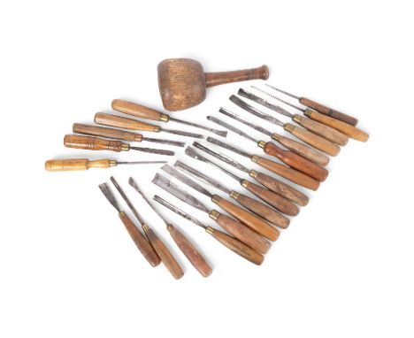 21 Vintage wood carving tools, to include chisels, and a carver's mallet