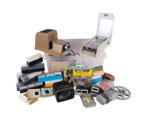 A quantity of Vintage slides and cinefilm, mostly relating to trains and trams, including a Specto colour slide projector, an