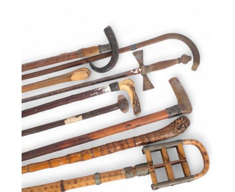A quantity of Antique walking sticks, ceremonial sword, bamboo shooting stick, etc (9) 