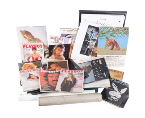 A collection of Vintage 1970s and 1980s pin-up calendars, Playboy magazines, and posters 