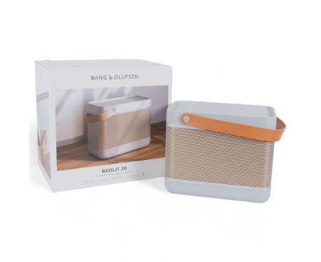 A Bang & Olufsen, Beolit 20 portable bluetooth speaker, with built-in wireless charging unit, in original box 