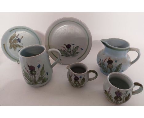 A collection of Buchan Portobello Scottish stoneware thistle items, to include jugs, lidded jars plates and oil and vinaigret