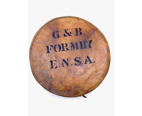 George Formby (1904-1961). George's personal wartime enamel wash basin with leather cover stamped 'G &amp; B Formby E.N.S.A.'