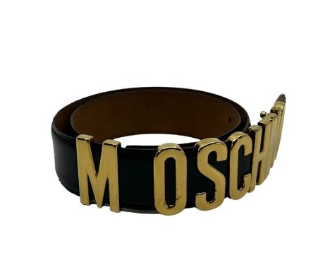 A Moschino black glace leather belt with gold tone metal lettering, fastens 89cm long fastens to a mx of 79.5 cm/ 31.5 inches