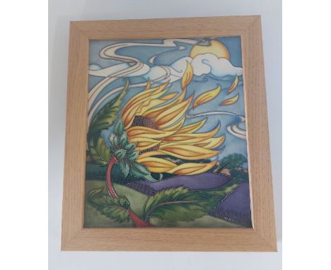 A Moorcroft ceramic framed Master Trial  plaque C 2019, is titled Sunseeker, decorated with a large sunflower enjoying the su