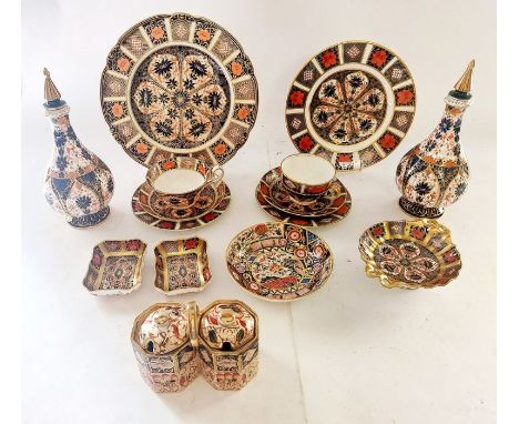 A group of 15 items of Royal Crown Derby Imari pattern 1128, to include a pair of lidded vases which stand 24 cm tall, 2 plat