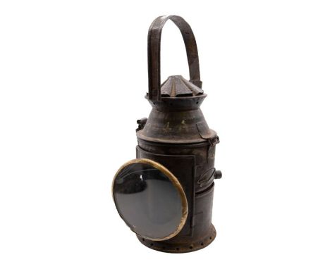 Oil fired rail signal lamp with interchangeable red and green lenses on a sliding mechanism. Early 20th century. Painted 204A