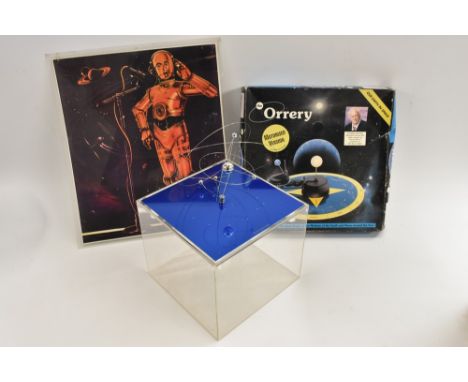 An Orrery, motorised version; C3PO placemat; Planet clock