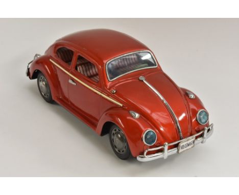 Volkswagen car, tinplate, battery operated, engine lights up and moves; Bump and Go Action, made in Japan
