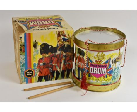 A Chad Valley drum, metal, plastic and melinex, includes drumsticks, boxed